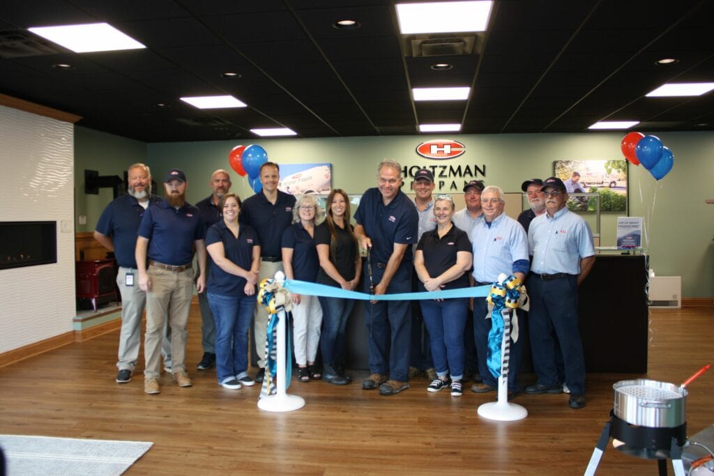 The Holtzman team cutting the ribbon with the Topsail Chamber of Commerce. 